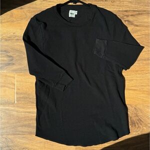 Waffle/textured half length tapered sleeve tee.